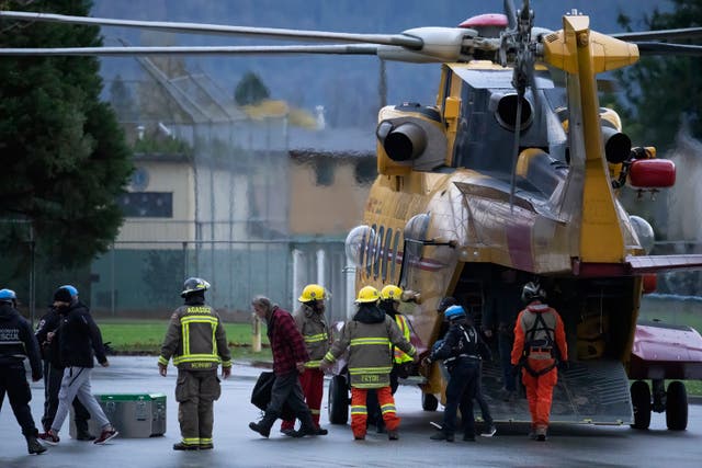 <p>Canadian Forces Cormorant helicopters ferry evacuees to safety</p>