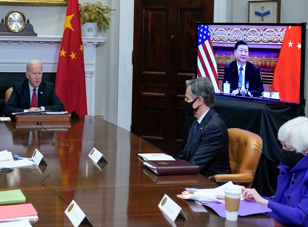 <p>President Joe Biden meets virtually with Chinese president Xi Jinping from the Roosevelt Room of the White House in Washington on Monday</p>