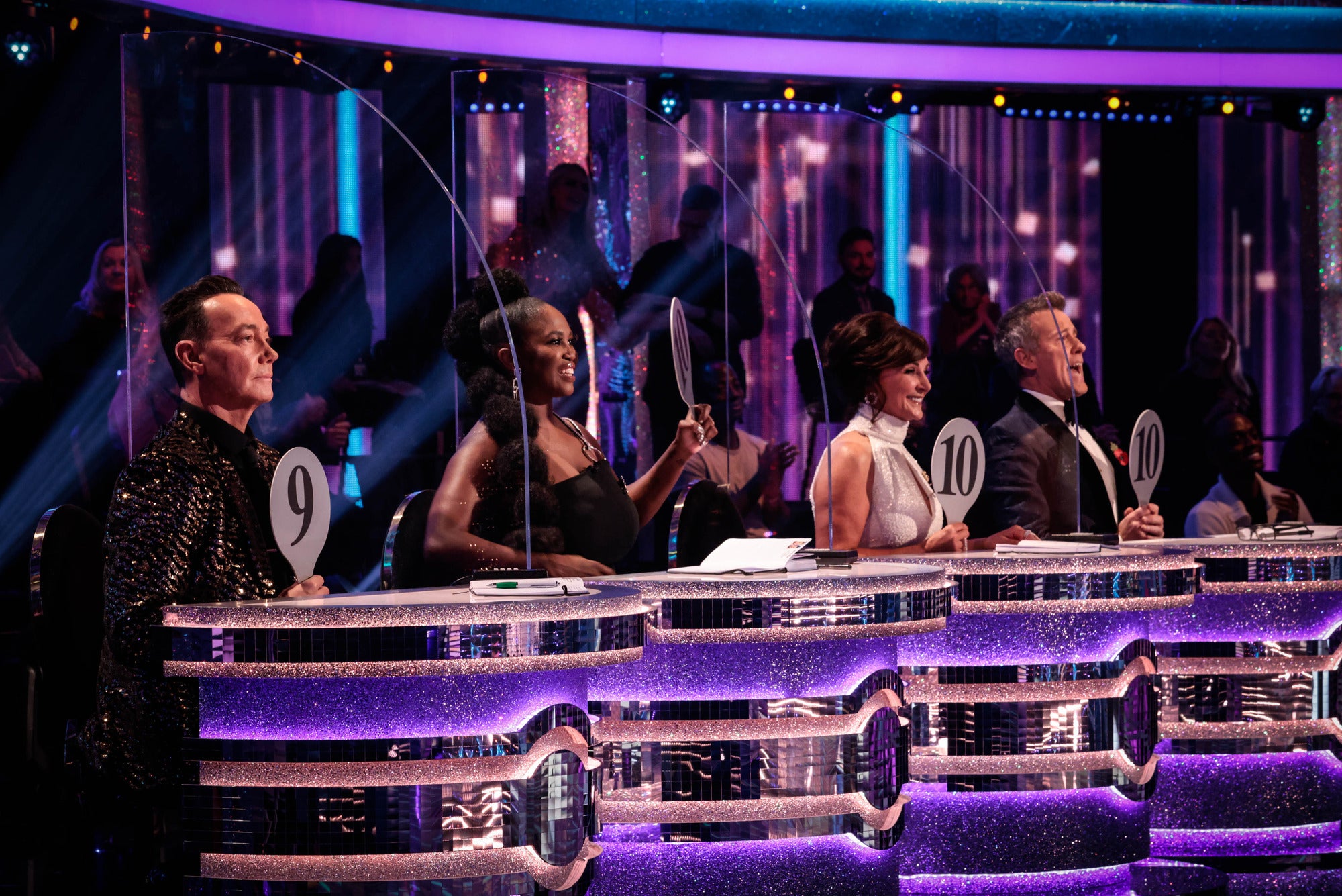 The ‘Strictly' judges are separated by perspex screens