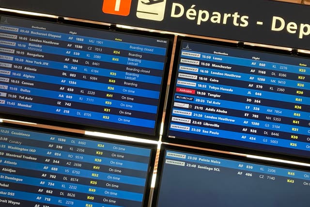 <p>Morning rush: departure screens at Paris CDG (file photo)</p>