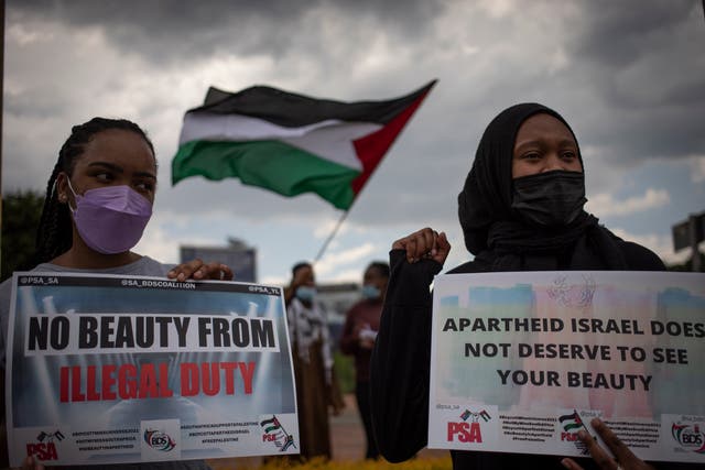 <p>Pro-Palestine supporters protest outside the offices of Miss South Africa, Johannesburg, South Africa on 12 November 2021. </p>