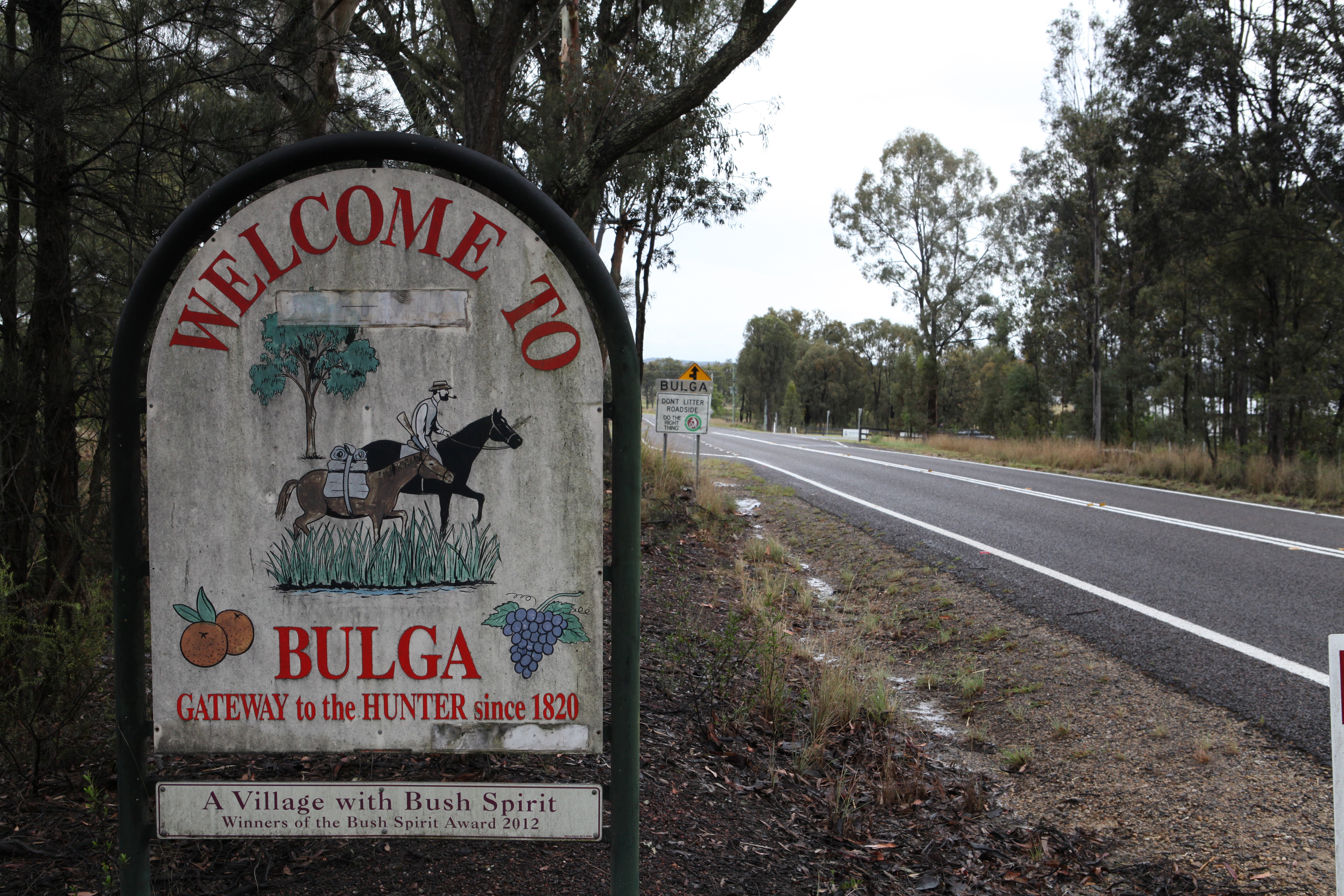 A sign welcoming travellers to Bulga, a town near Singleton, Australia, that is now almost surrounded by open-cut mines