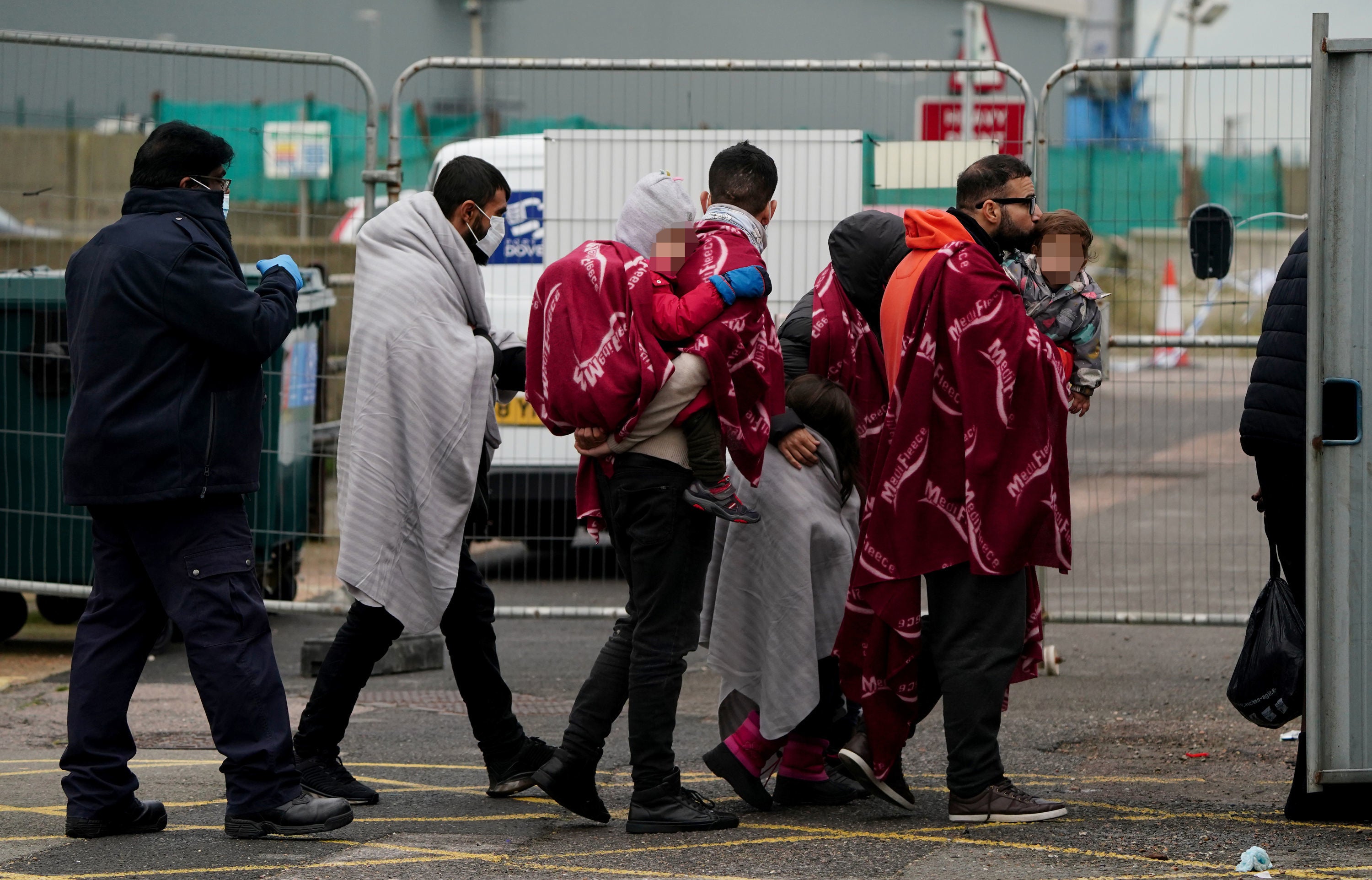A group of people thought to be migrants arrive in Dover, Kent, in November, after being rescued by the Dover lifeboat