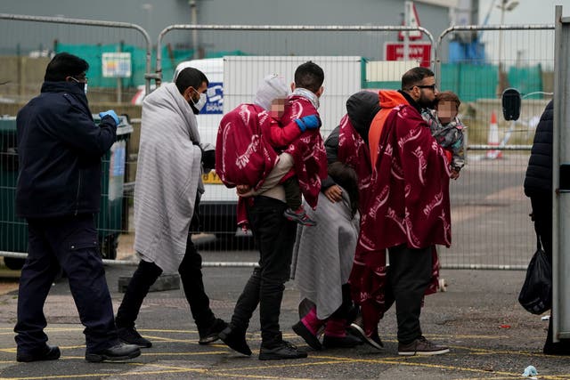 <p>A group of people thought to be migrants arrive in Dover, Kent, in November, after being rescued by the Dover lifeboat</p>