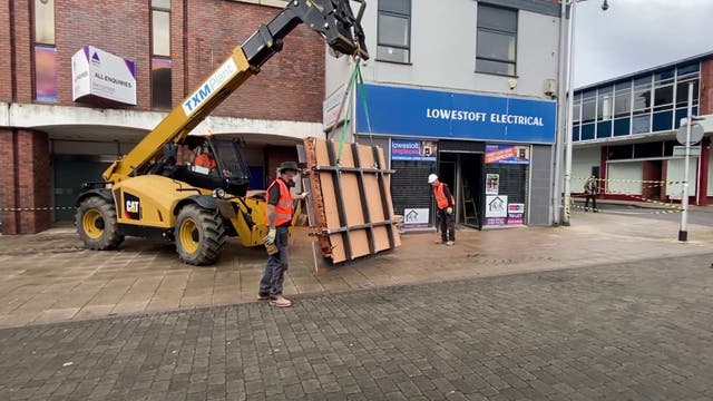 <p>The wall was removed via a yellow telehandler </p>