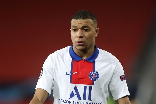 Paris St Germain’s Kylian Mbappe is unlikely to join Real Madrid in January (Martin Rickett/PA)