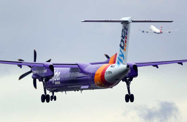 Collapsed airline Flybe has announced it will return to the skies early next year (Steve Parsons/PA)
