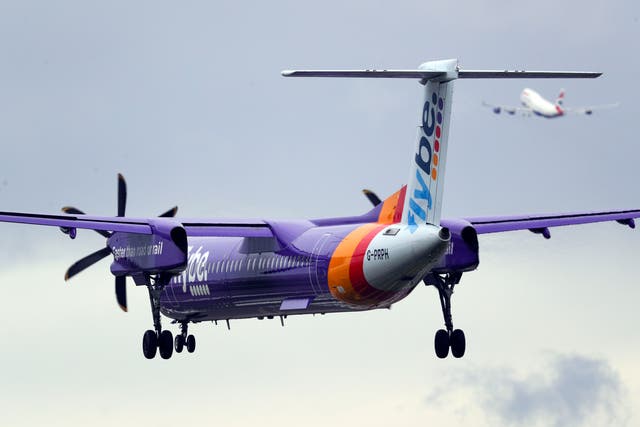 Collapsed airline Flybe has announced it will return to the skies early next year (Steve Parsons/PA)