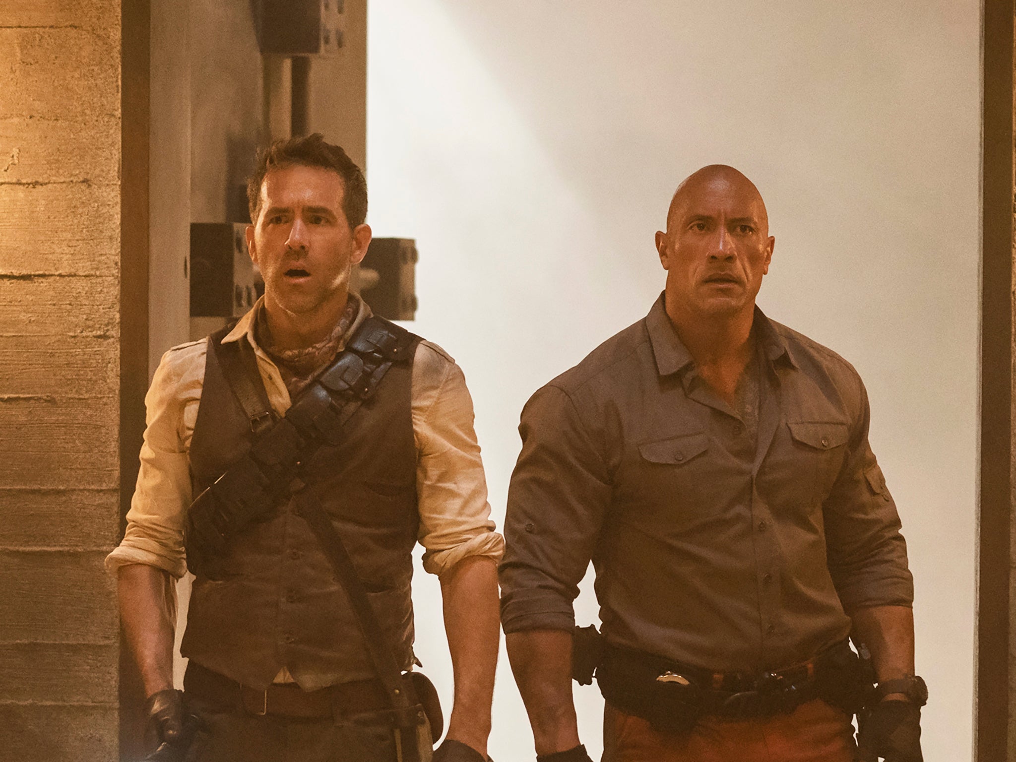 Ryan Reynolds and Dwayne Johnson in ‘Red Notice’