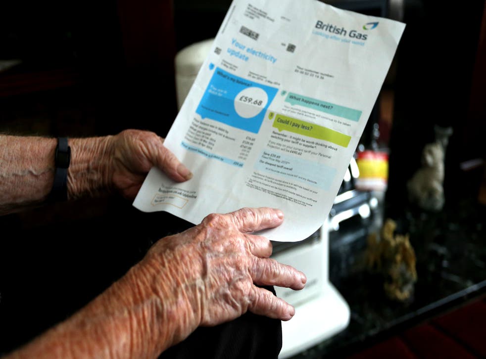 A generic stock photo of an elderly lady holding a British Gas bill at home in Liverpool (PA)