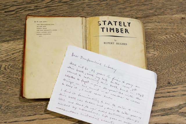 <p>A library book that has been returned more than 73 years late with a note</p>