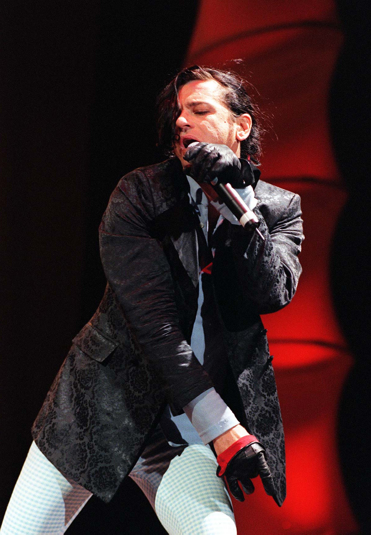 Hutchence on stage at the Wembley Arena in London