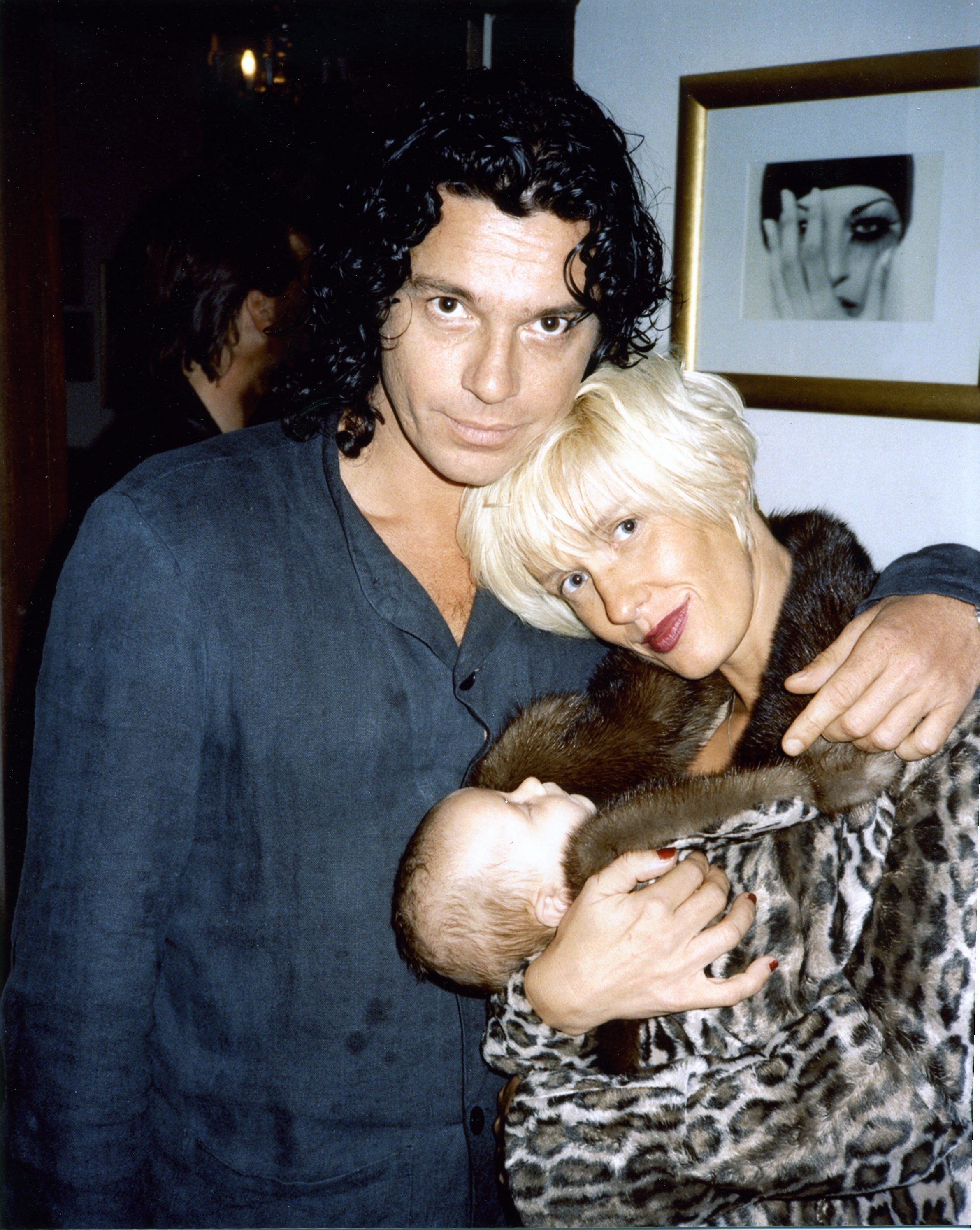 Hutchence and Paula Yates with their daughter, Tiger Lily, in 1996