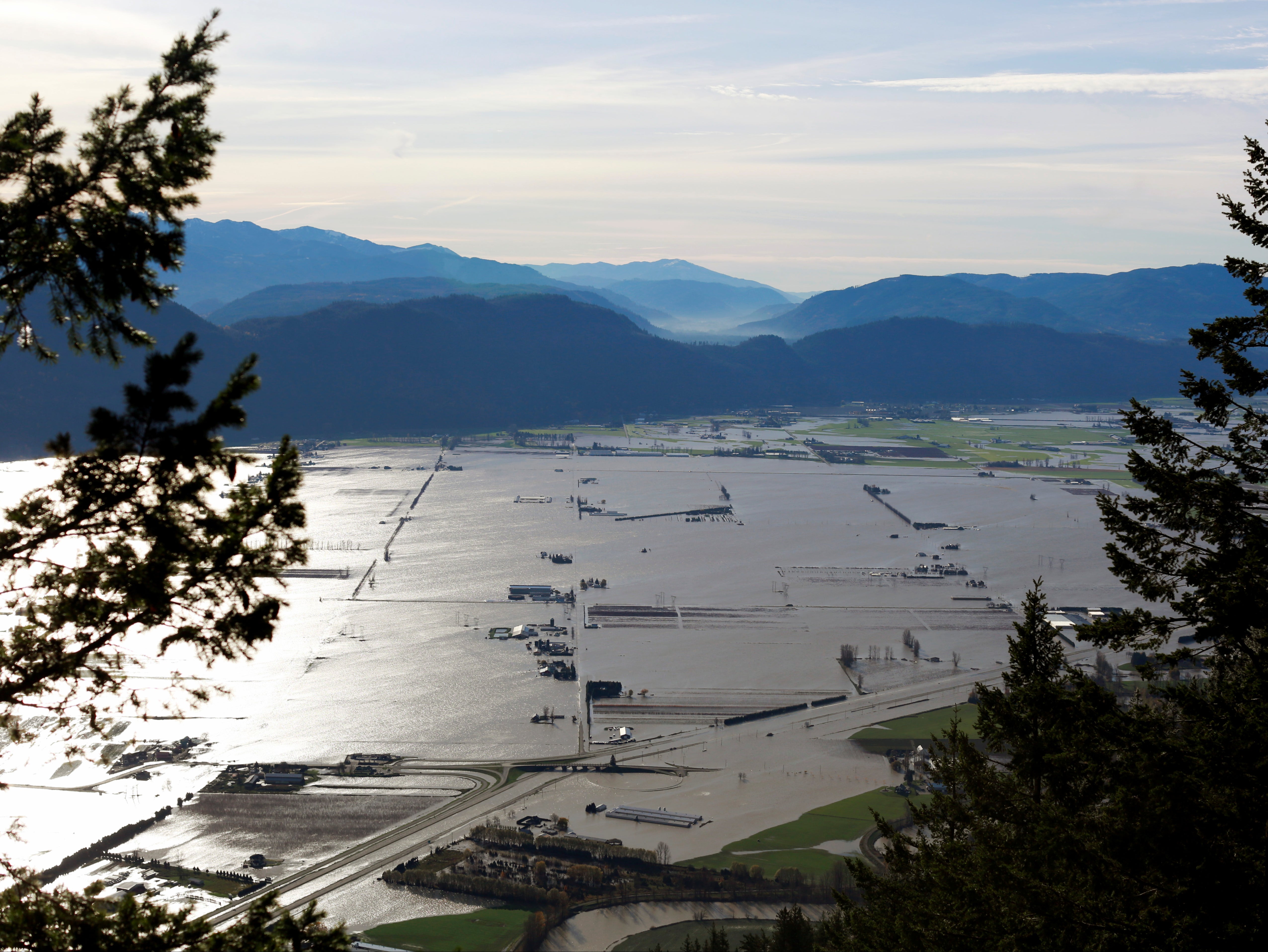 Flooded houses and farms are seen from the top of Sumas Mountain