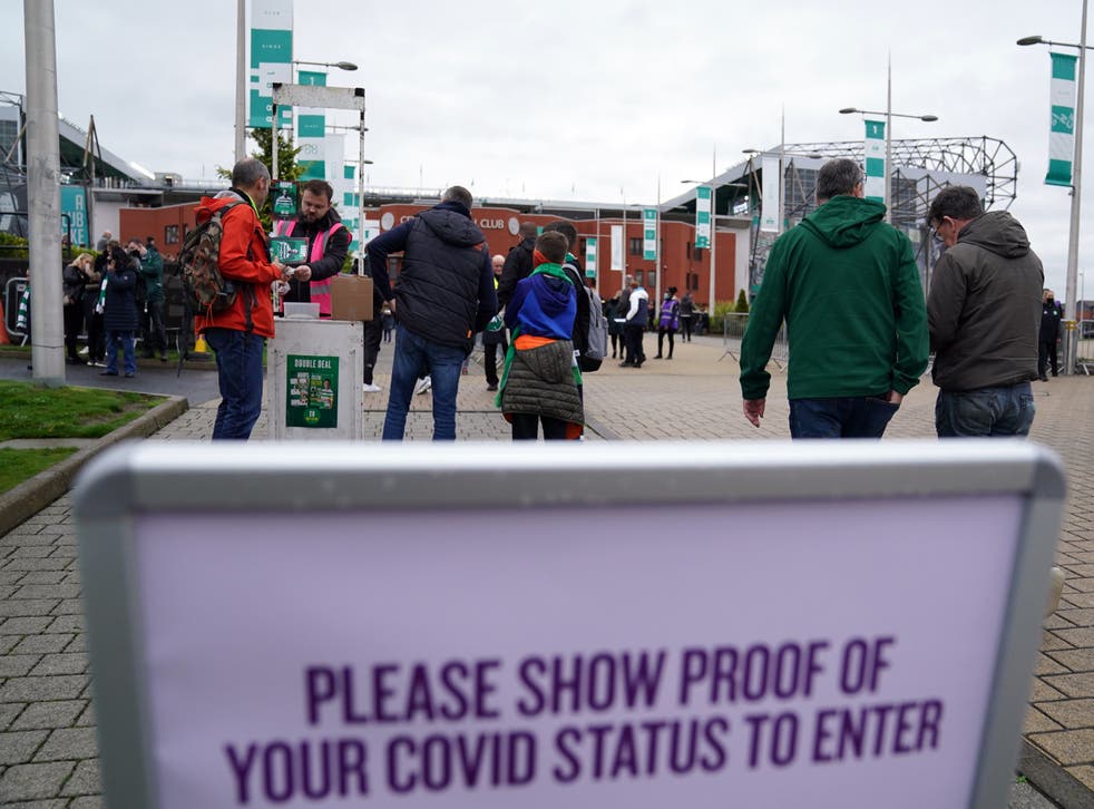 Vaccine passports were introduced for certain large events as well as nightclubs (Andrew Milligan/PA)