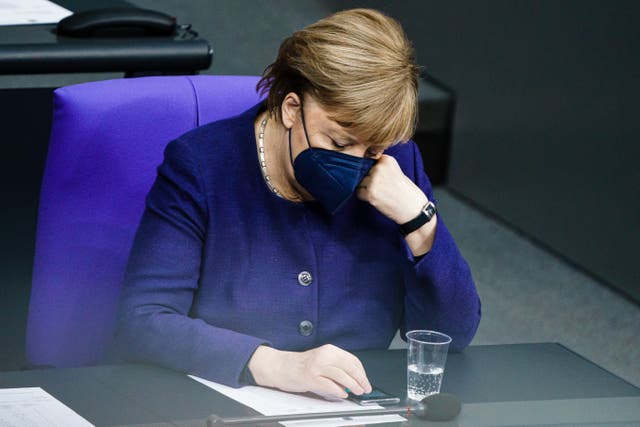 <p> German chancellor Angela Merkel during the latest Bundestag session on coronavirus restrictions</p>