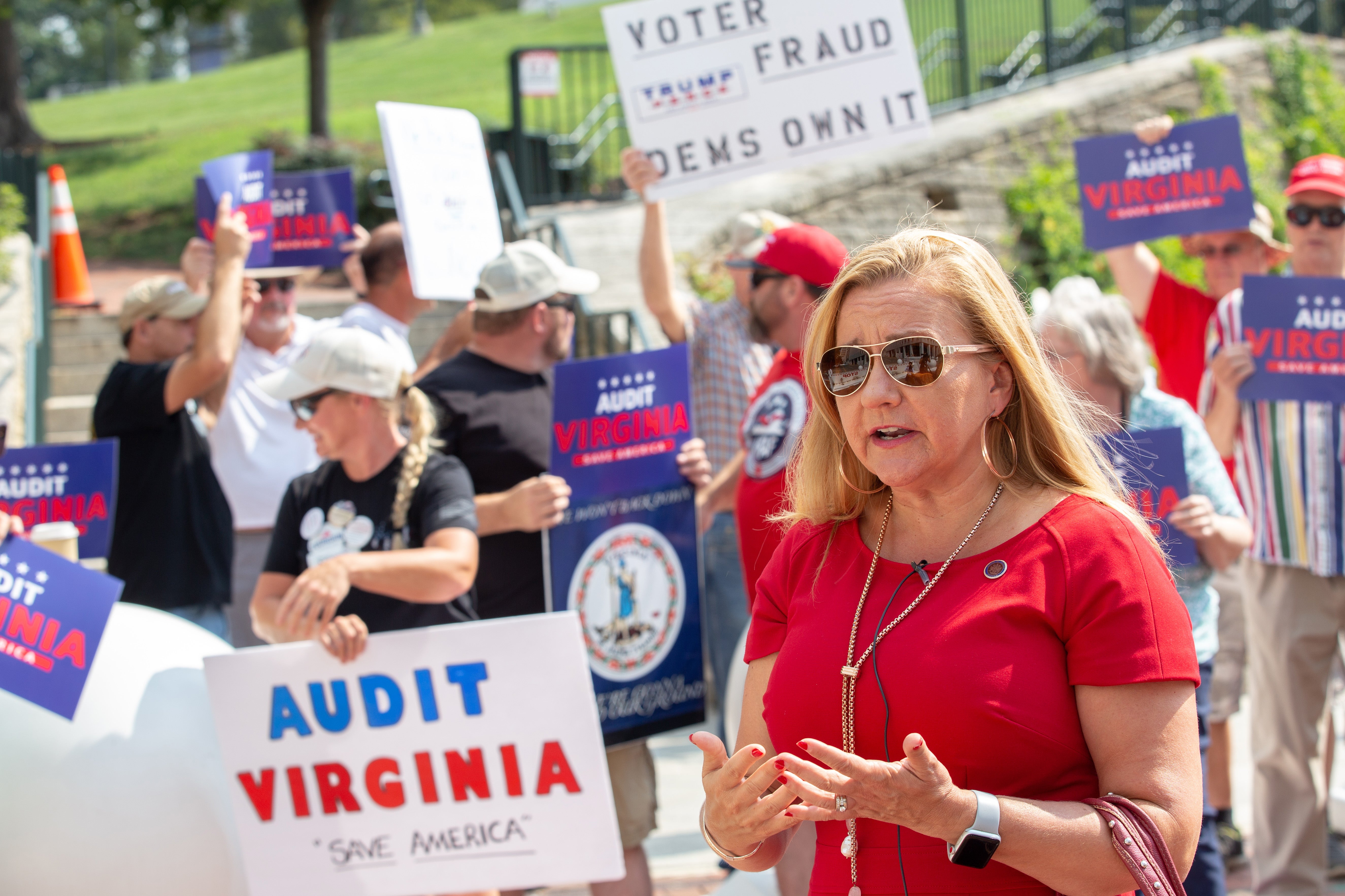 State Sen. Amanda Chase, R-Chesterfield, right, takes part in an August demonstration in Richmond calling for an audit of the 2020 general election in Virginia