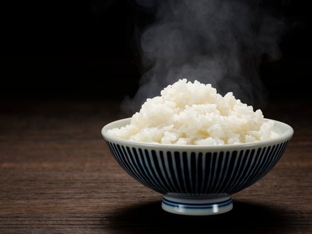 <p>A small bowl of white rice</p>