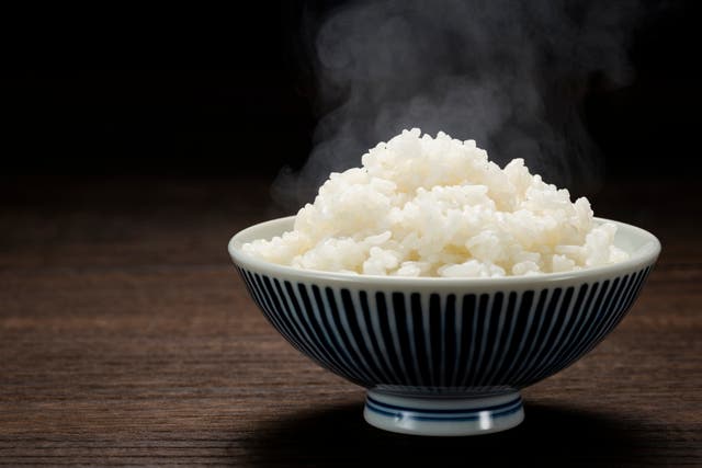 <p>A small bowl of white rice</p>
