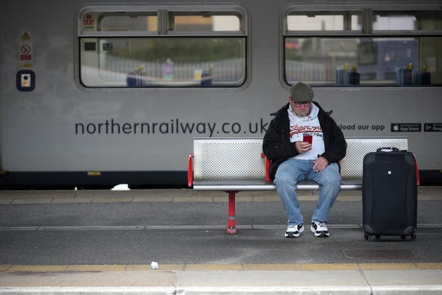 <p>A passenger waits at Bradford Interchange station yesterday</p>