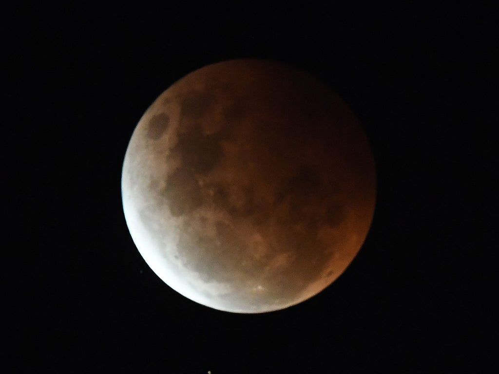 What makes a ‘blood moon’ red and is it dangerous to look at it?
