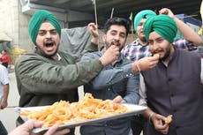 Indian farmers call off year-long protests after government agrees to all demands