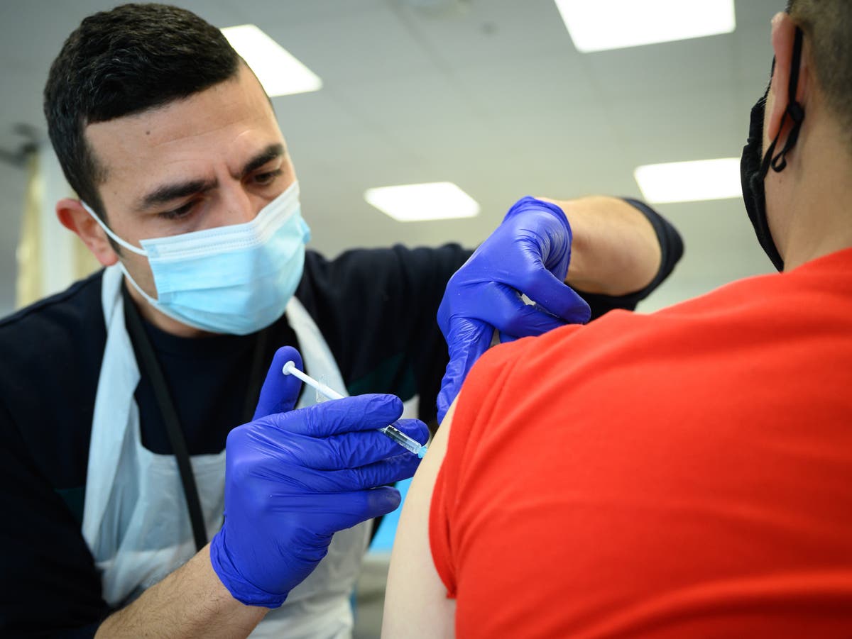 Covid boosters to be recommended for younger adults ‘within hours’, says minister