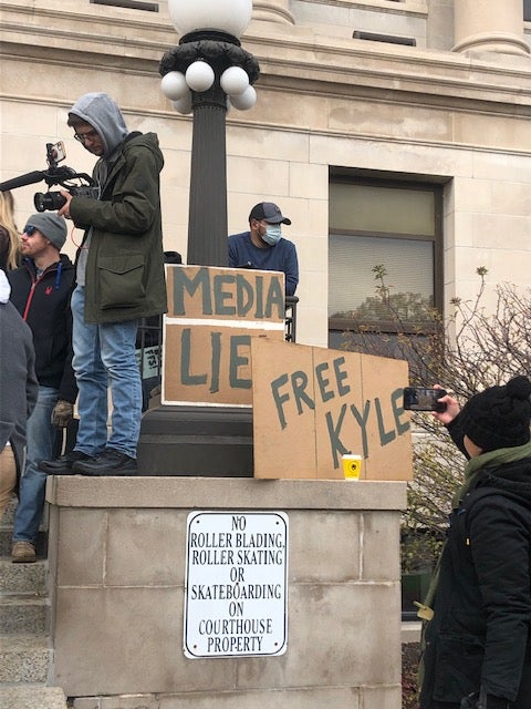 The steps of the Kenosha County Courthouse in Wisconsin erupted into chaos following the acquittal on all five felony charges of Kyle Rittenhouse, 18, who killed two people and wounded a third last year