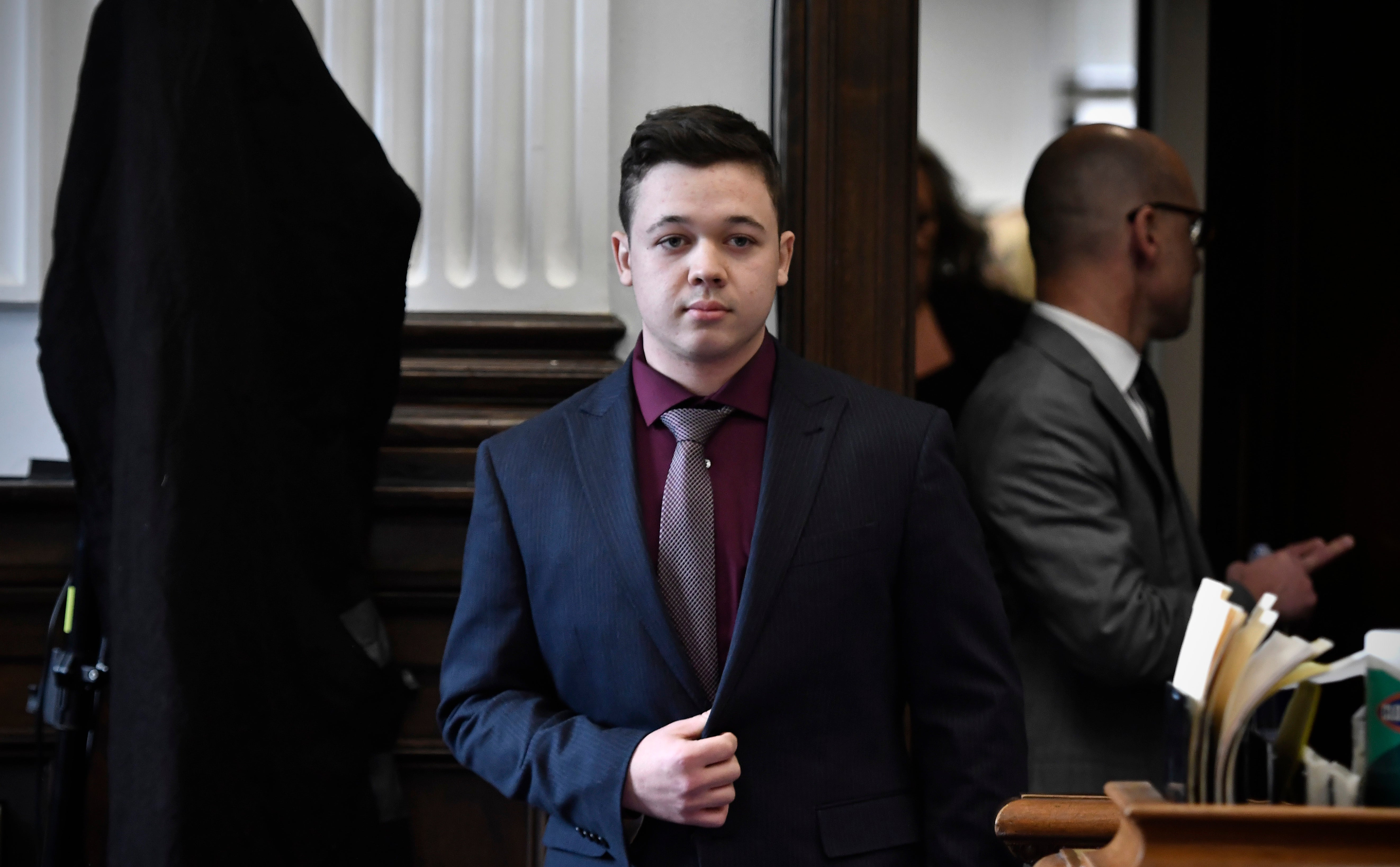 <p>Kyle Rittenhouse enters the courtroom to hear the verdicts in his trial at the Kenosha County Courthouse. </p>