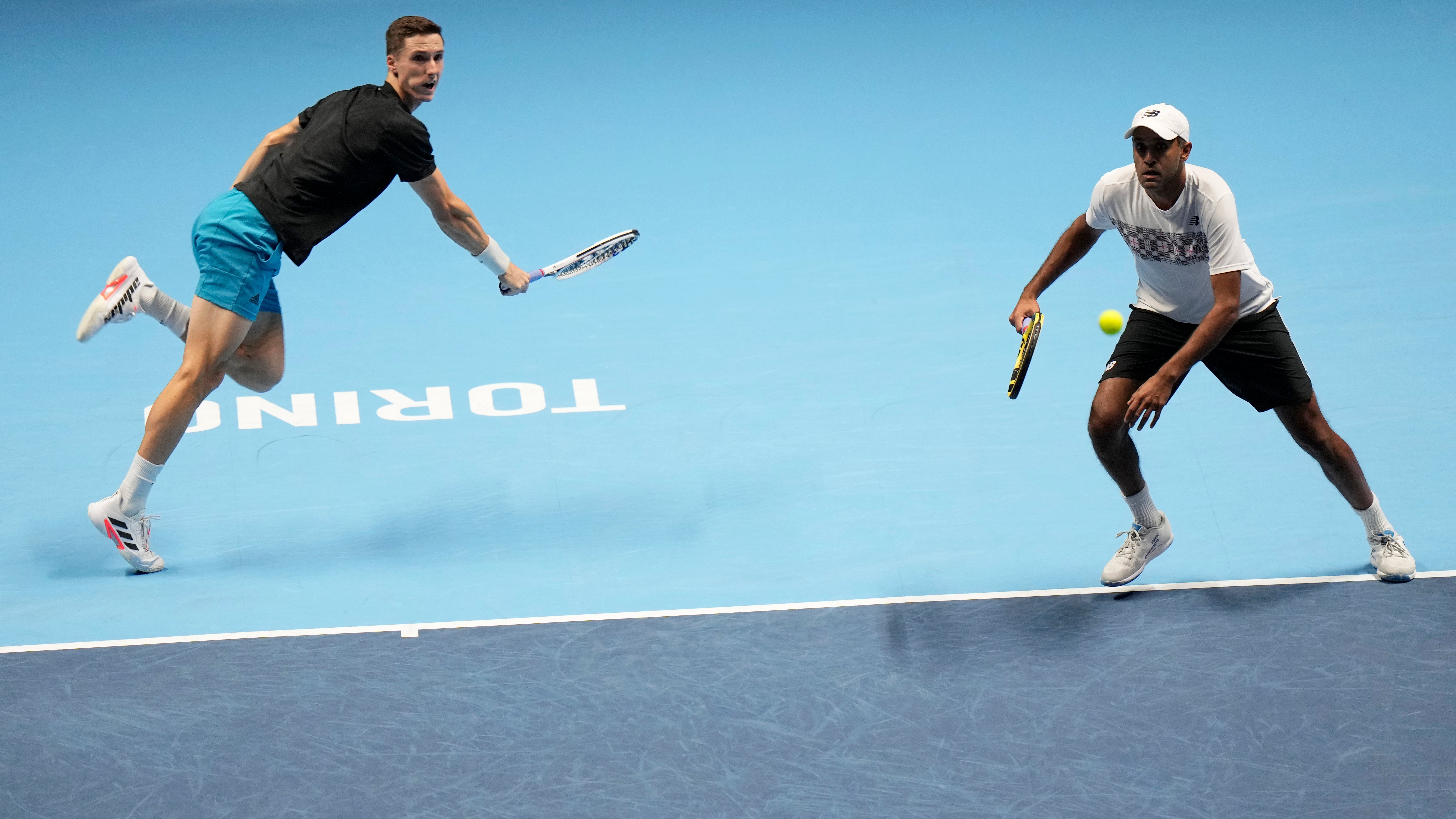 Joe Salisbury, left, and Rajeev Ram are through to the final at the Nitto ATP Finals (Luca Bruno/AP)