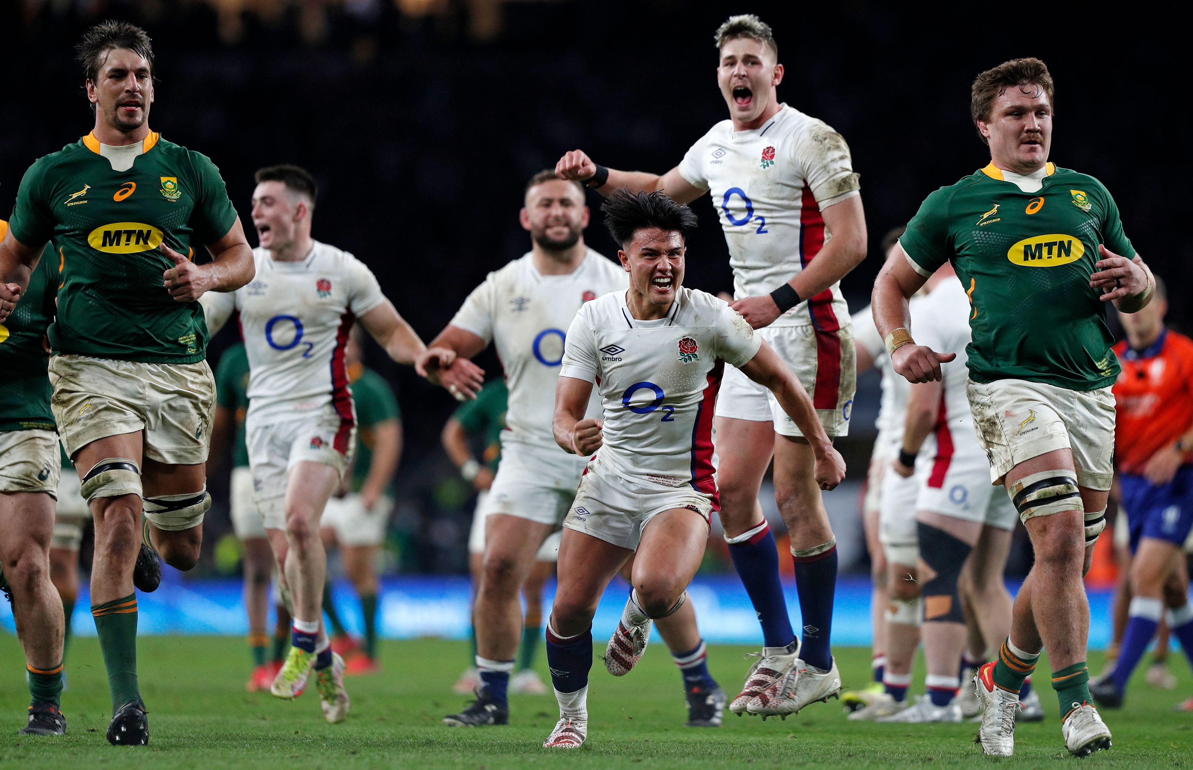 England players show their delight at the final whistle after beating the Springboks at Twickenham