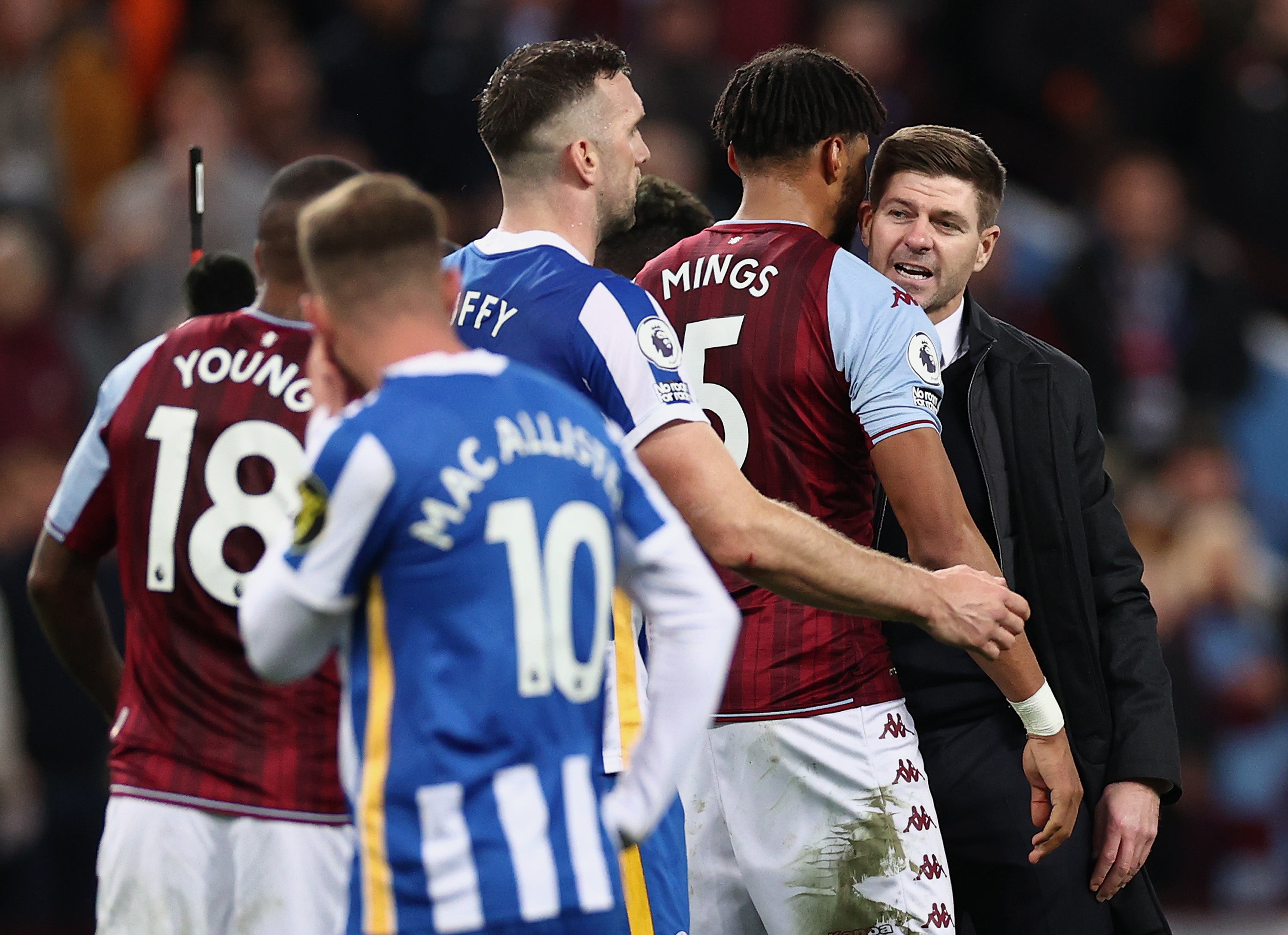 Steven Gerrard embraces Tyrone Mings of Aston Villa