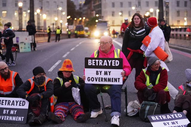 <p>Supporters of the nine jailed Insulate Britain climate activists take part in a demonstration on Lambeth Bridge in central London on Saturday.</p>