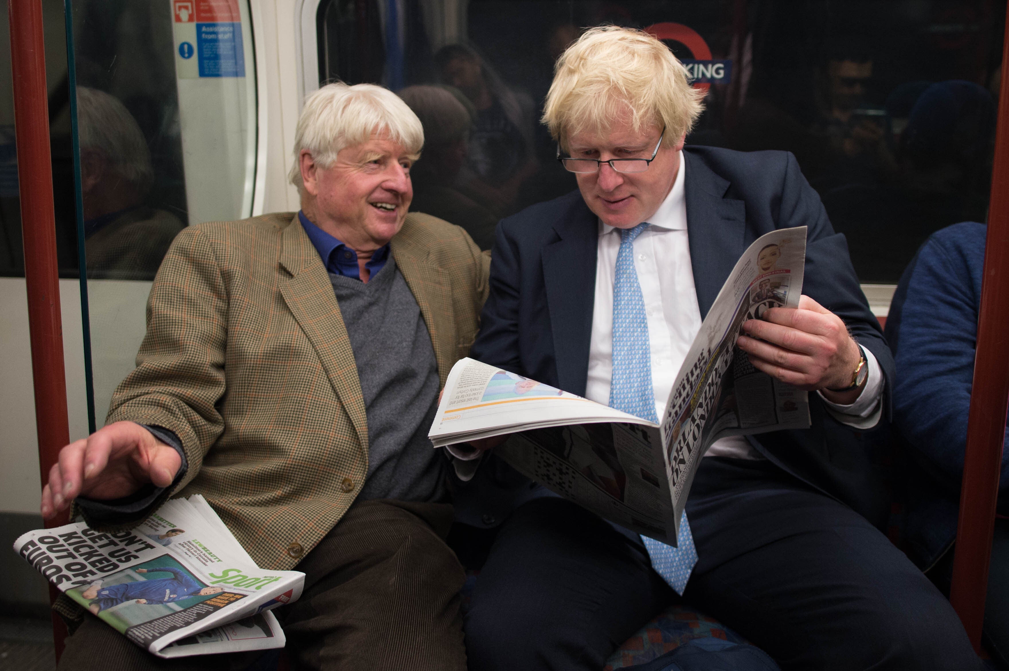 Boris Johnson sits next to his father Stanley on the Bakerloo line after bumping into him by chance on the Tube