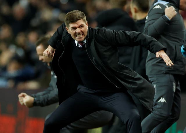 <p>Steven Gerrard celebrates on the touchline</p>