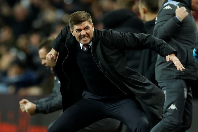 <p>Steven Gerrard celebrates on the touchline</p>