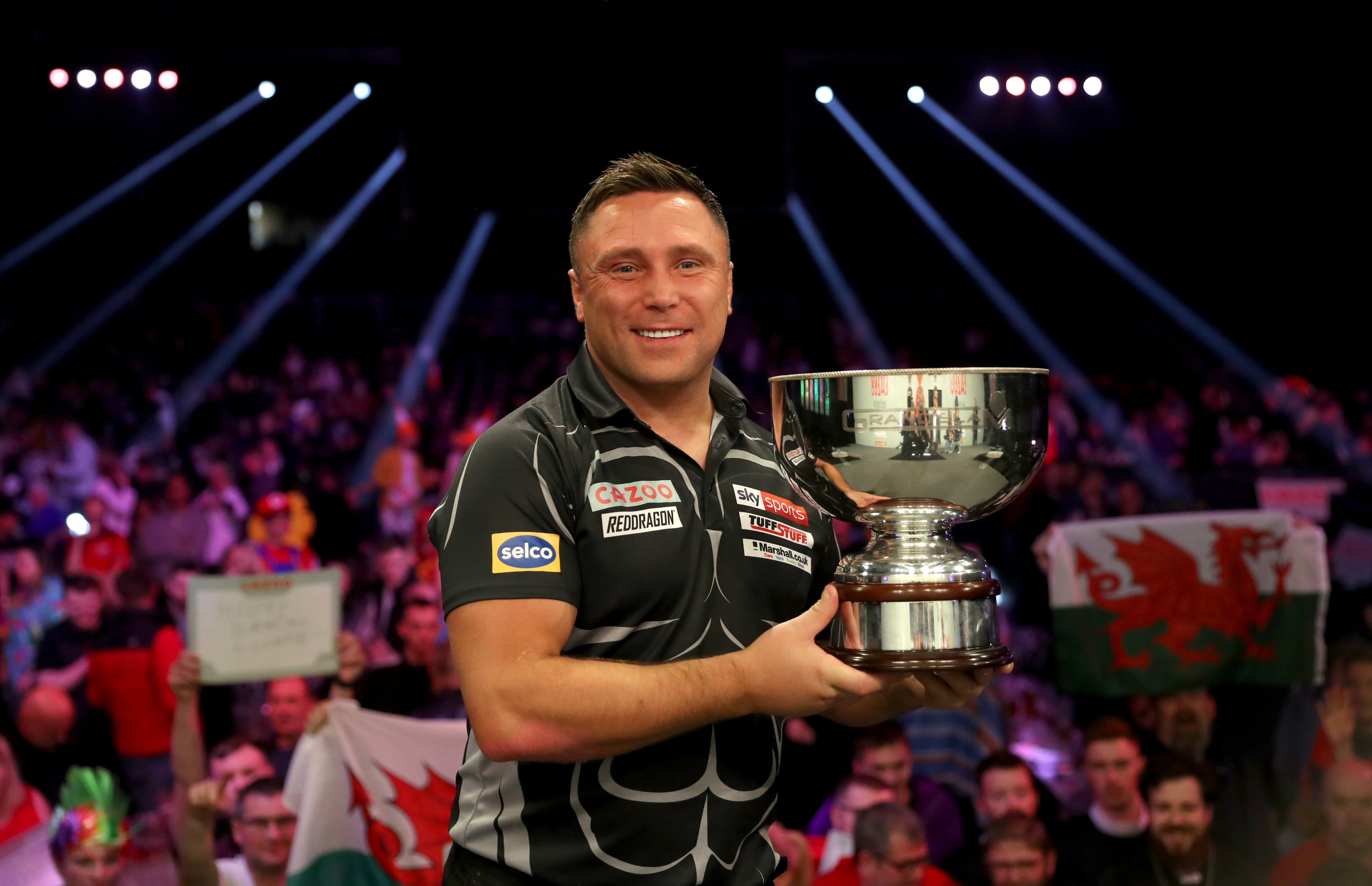 Gerwyn Price won a third Grand Slam of Darts title in fours years with victory over Peter Wright (Bradley Collyer/PA)