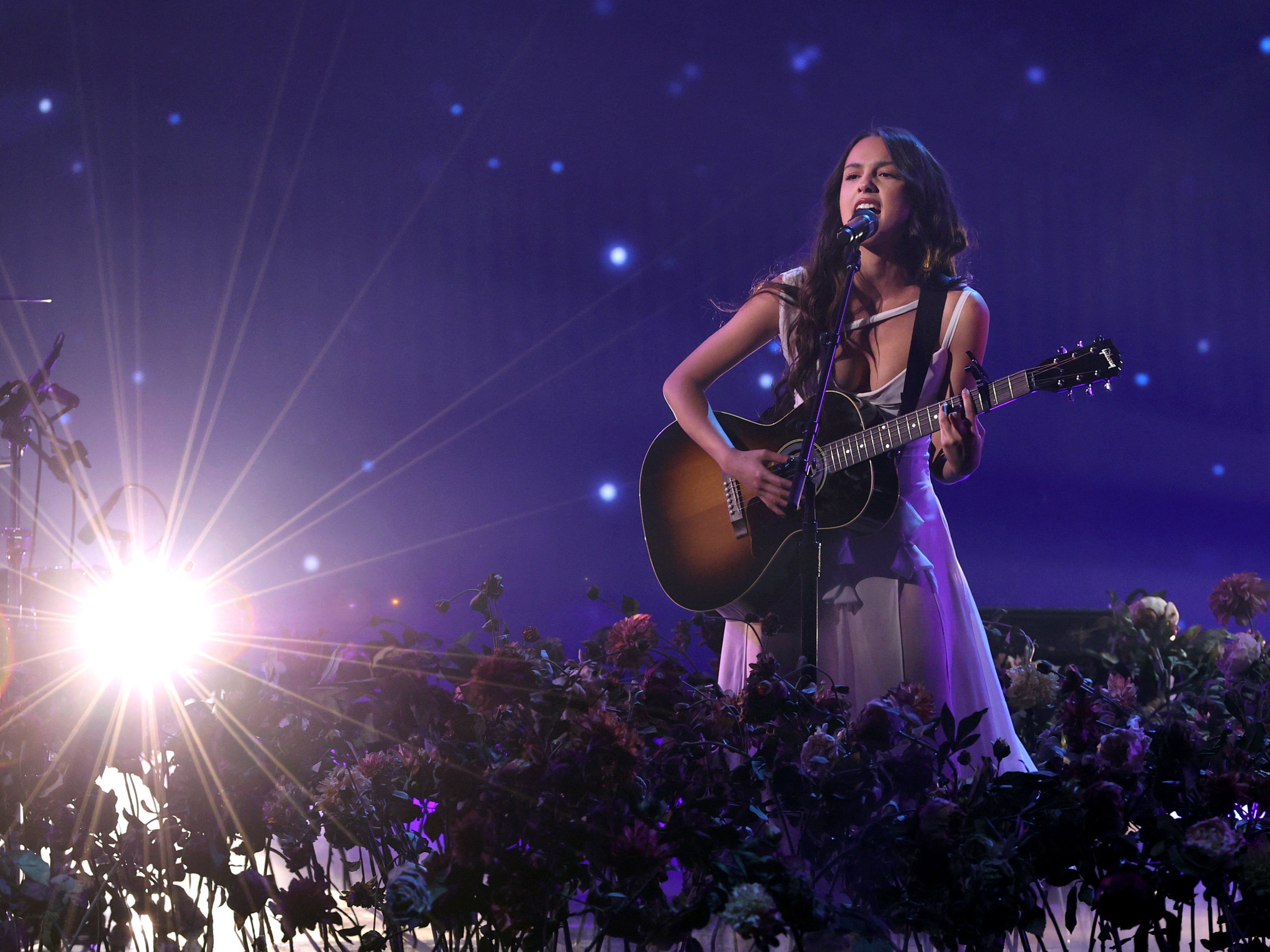 Olivia Rodrigo performing onstage during the 2021 American Music Awards.