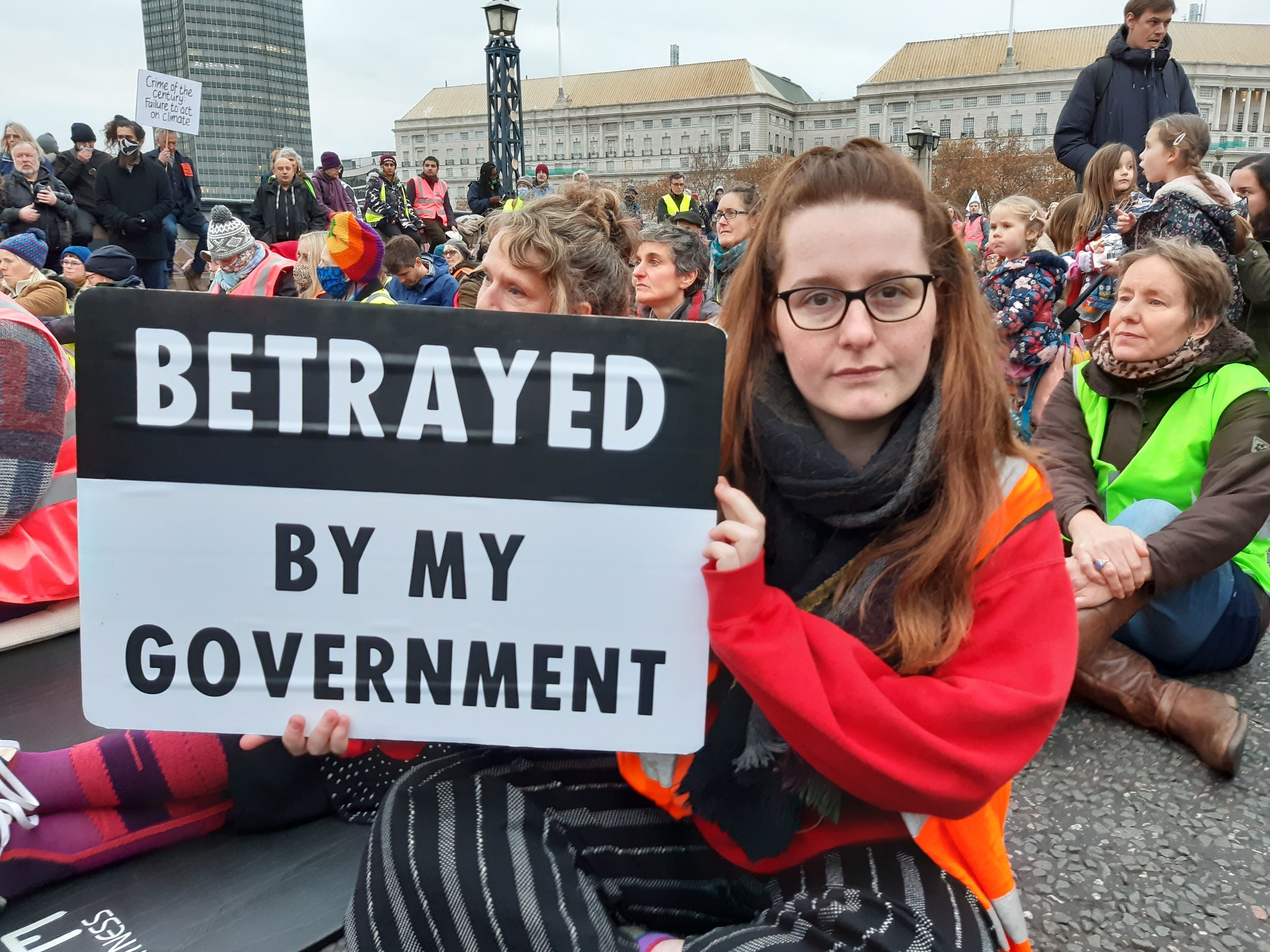 Gabriella Ditton among climate protesters blocking Lambeth Bridge in central London with a sit-down demonstration