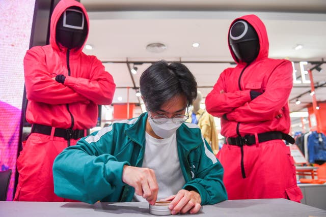 <p>File photo: A man participates in a ‘Squid Game’-inspired mission at a department store in Bangkok</p>