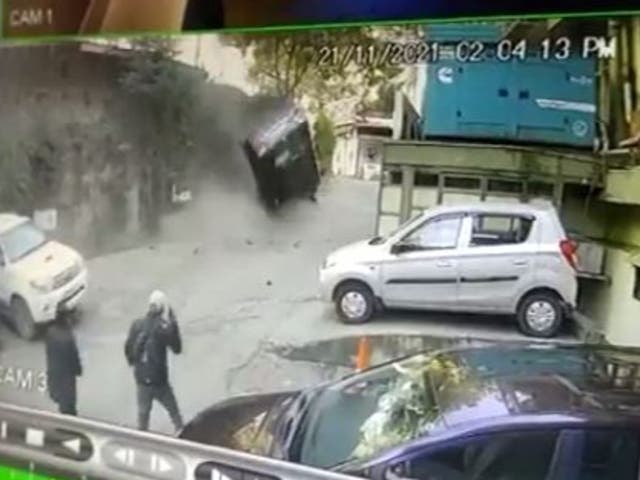 <p>CCTV footage shows the car skidding and falling onto a parking lot of a hotel in India’s popular tourist city of Shimla</p>
