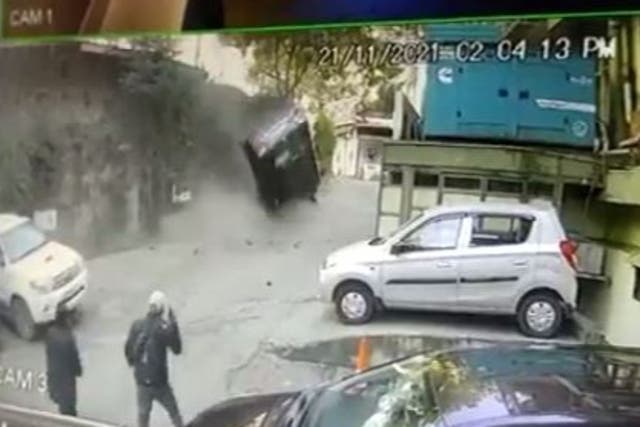 <p>CCTV footage shows the car skidding and falling onto a parking lot of a hotel in India’s popular tourist city of Shimla</p>