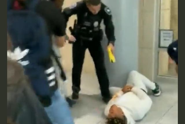 <p>Screengrab: Viral videos on social media show police allegedly using taser guns on high school students in Texas</p>