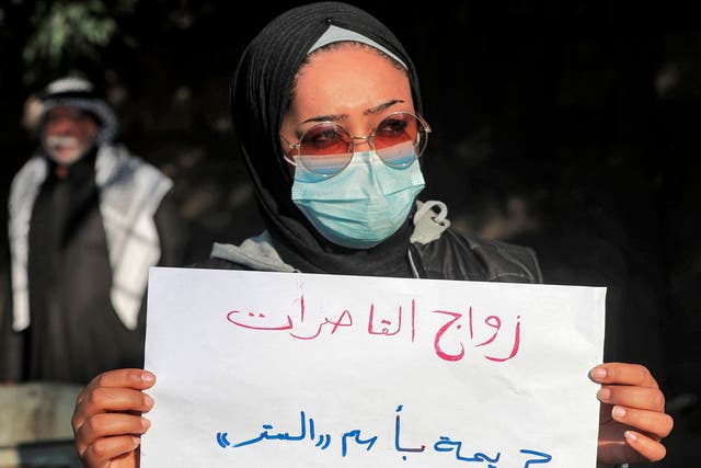 <p>Women demonstrate near the Kadhimiya court in Iraq's capital Baghdad in protest against the legalisation of a marriage contract for a 12-year-old girl</p>
