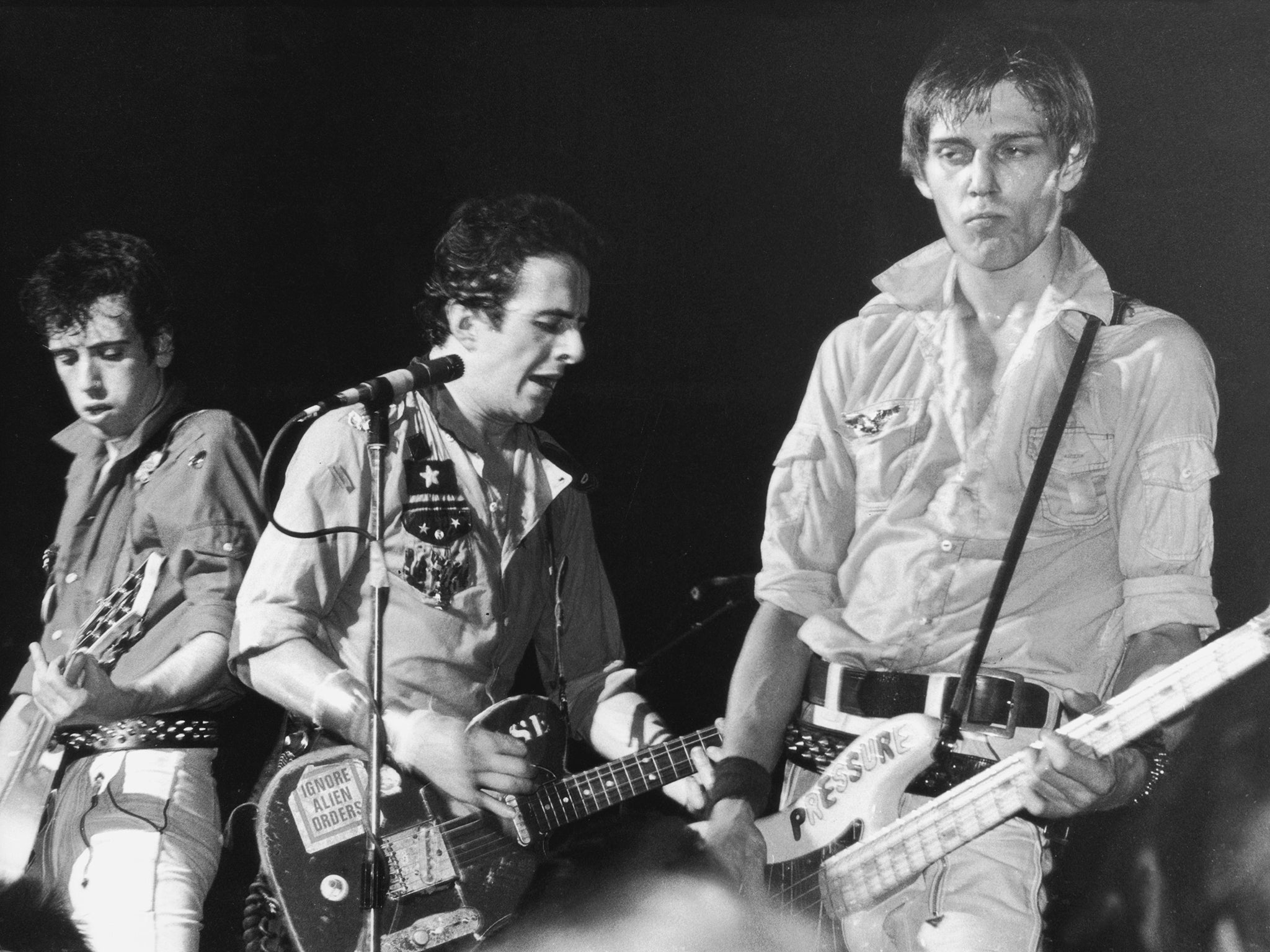 Mick Jones, Joe Strummer and Paul Simonon of The Clash, in concert in 1980