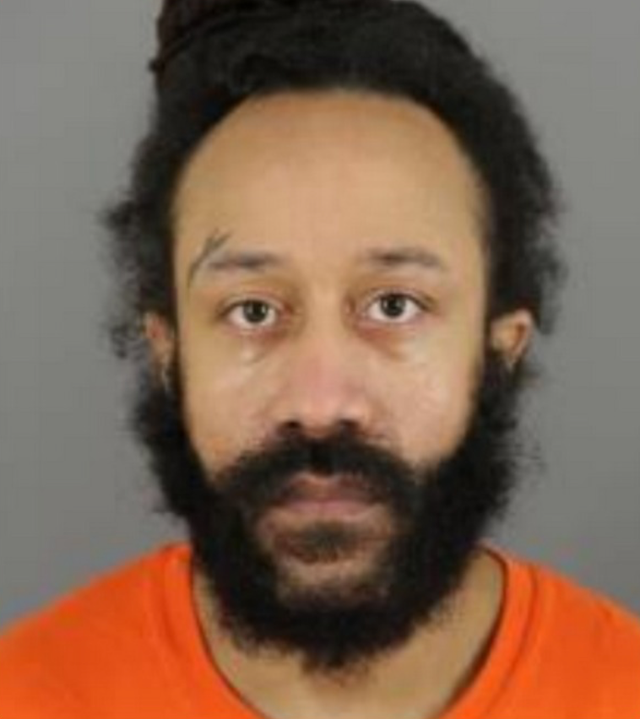 <p>Darrell Brooks, 39, was taken into custody on Sunday night. This mugshot is from a previous arrest </p>
