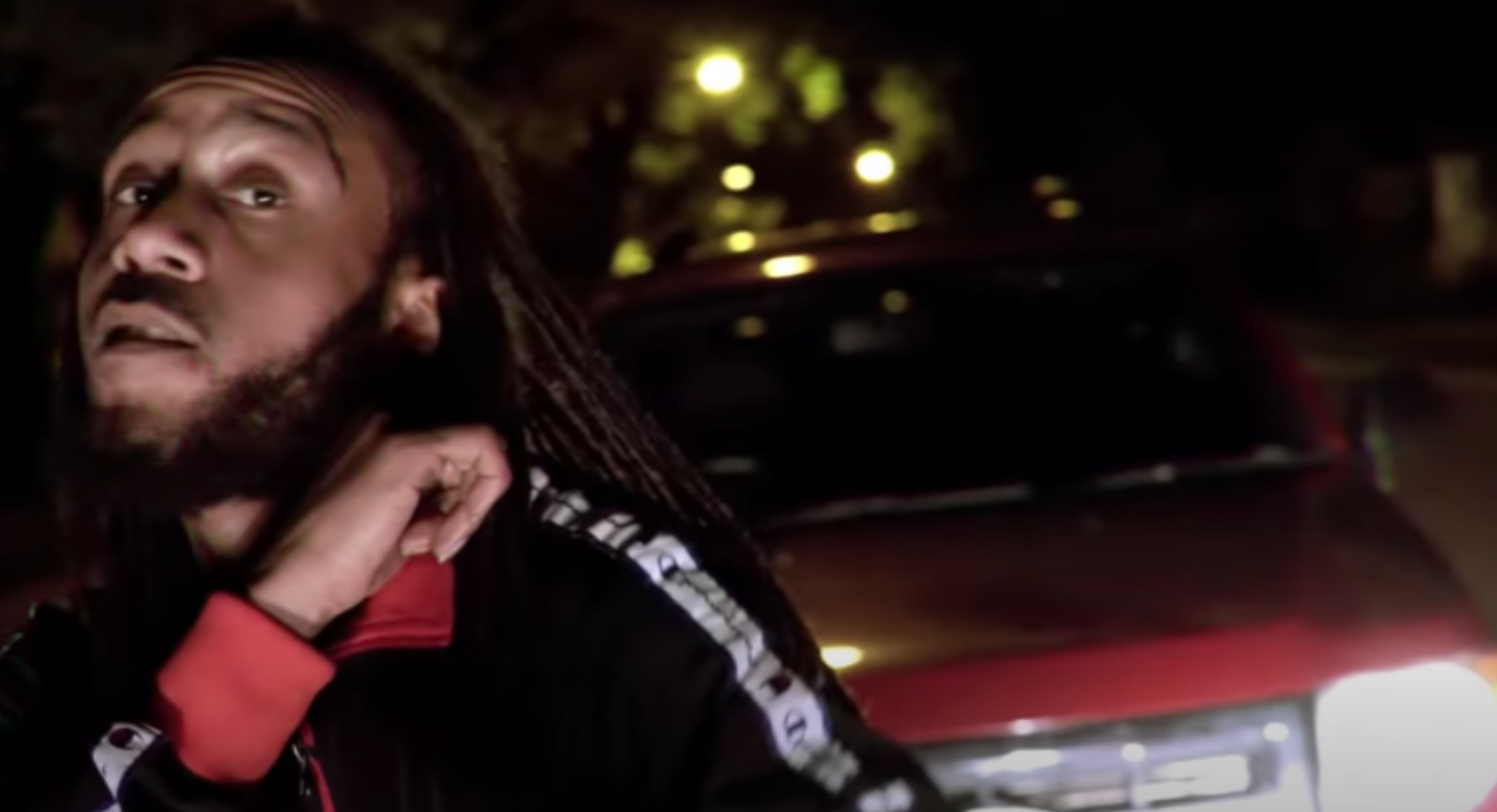 Darrell Brooks in a music video posted online which shows his red SUV behind him