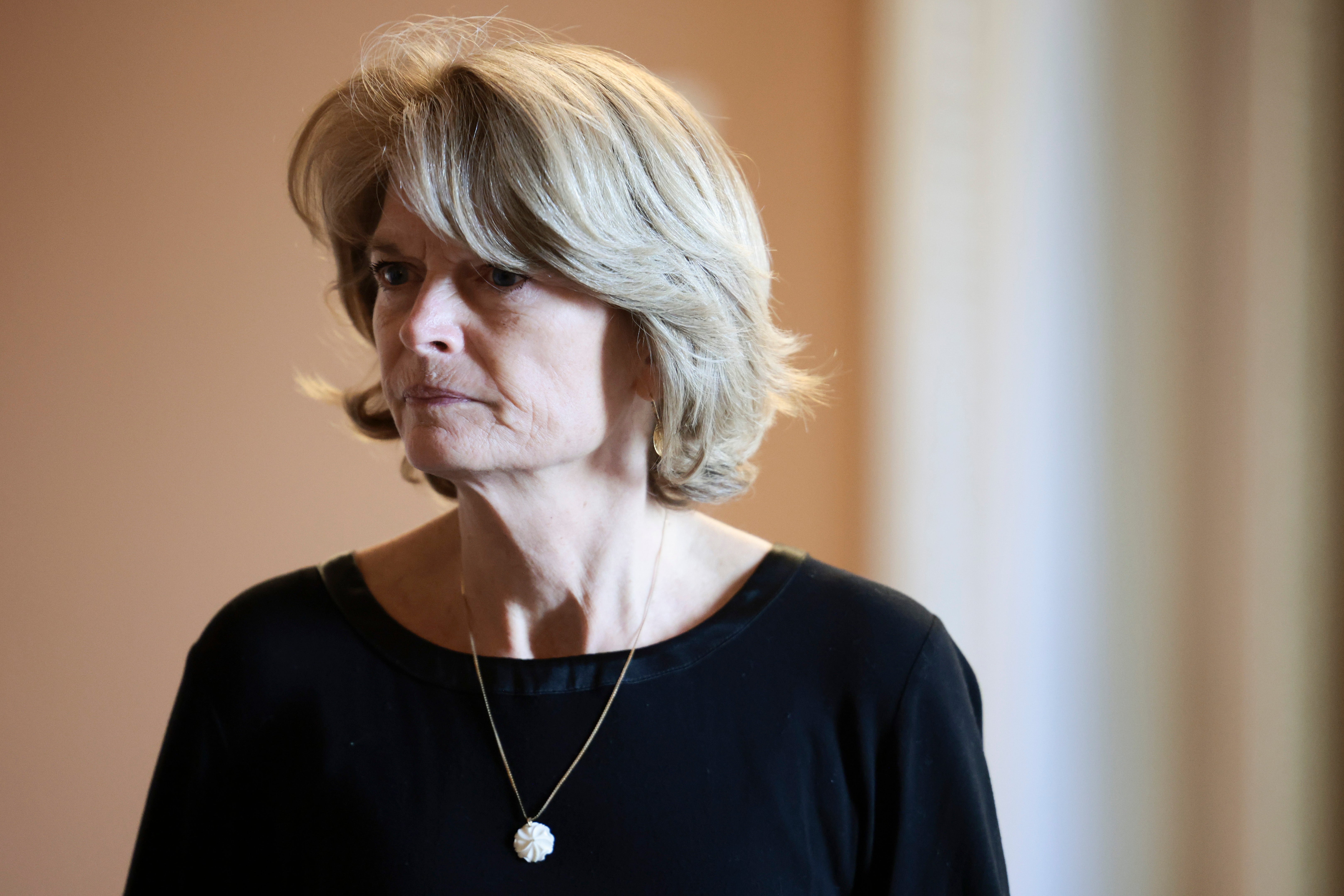<p>Sen. Lisa Murkowski (R-AK) walks to a vote in the Senate Chambers of the U.S. Capitol on October 19, 2021 in Washington, DC.</p>