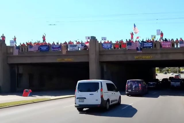 <p>QAnon supporters gather in Texas to await John F Kennedy’s return from the dead</p>