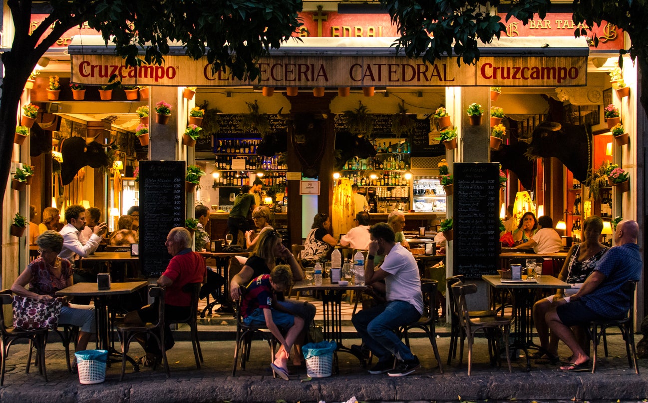 Don’t flaunt your tourist status by heading out for dinner before 9pm